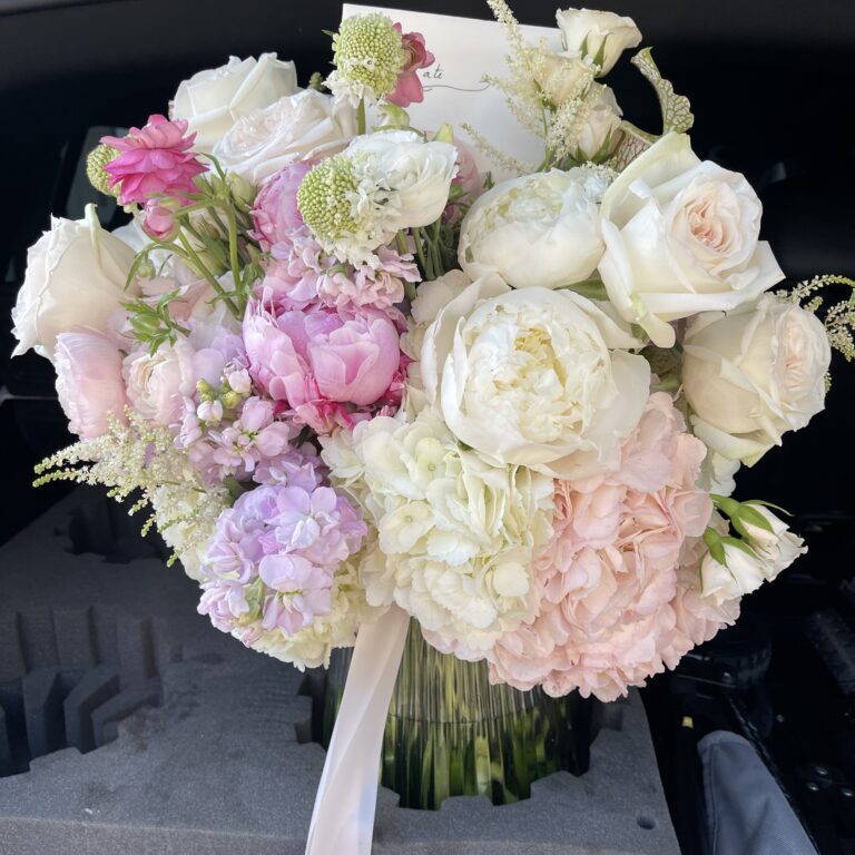 Pastel bouquet of roses and peonies