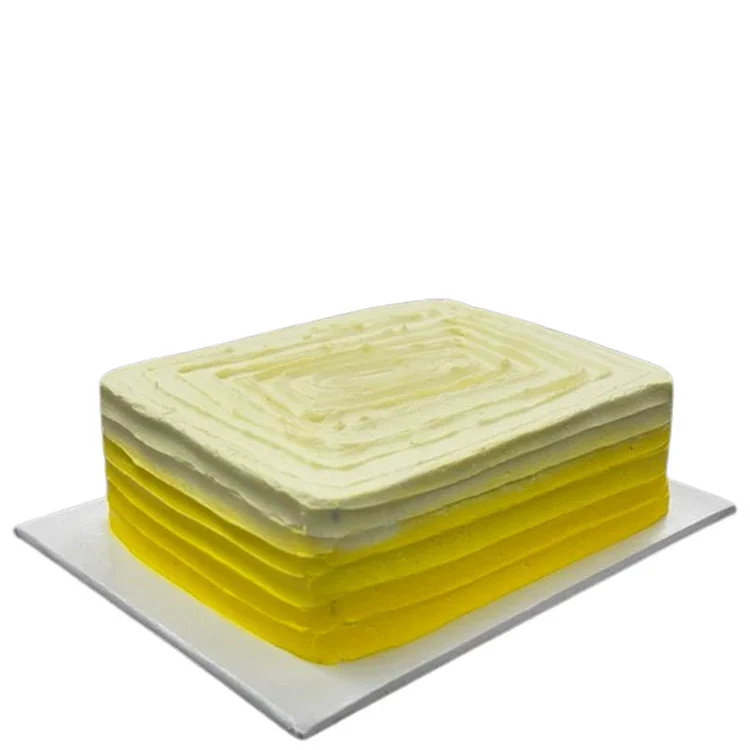 Yellow and white layered rectangular cake