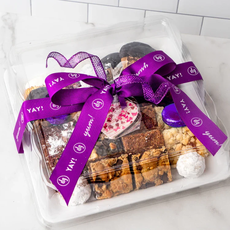 Assorted desserts gift box with purple ribbon