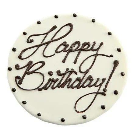 Round white cookie with "Happy Birthday" icing